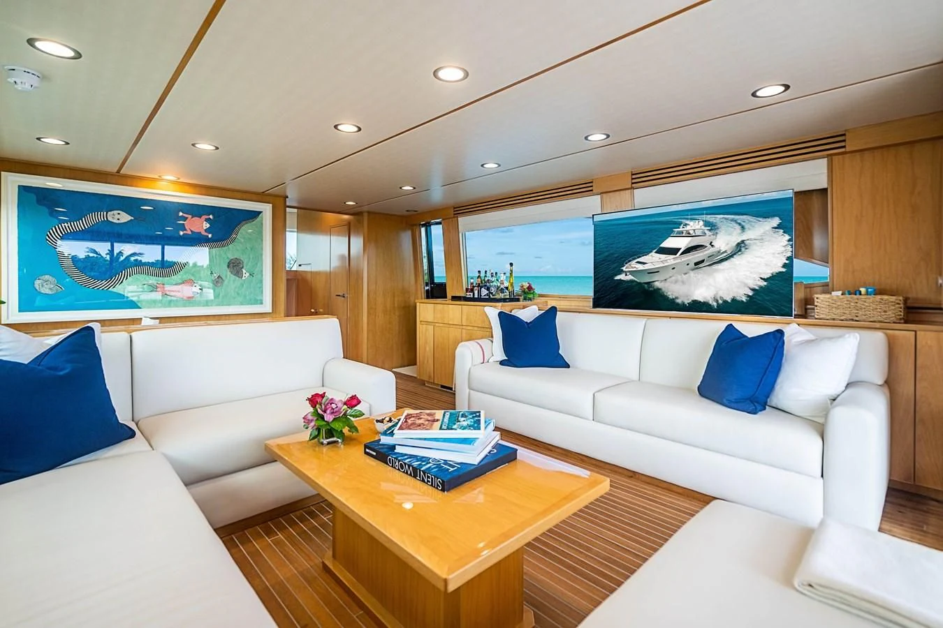 a living room with a couch and a table aboard MARYBELLE Yacht for Sale