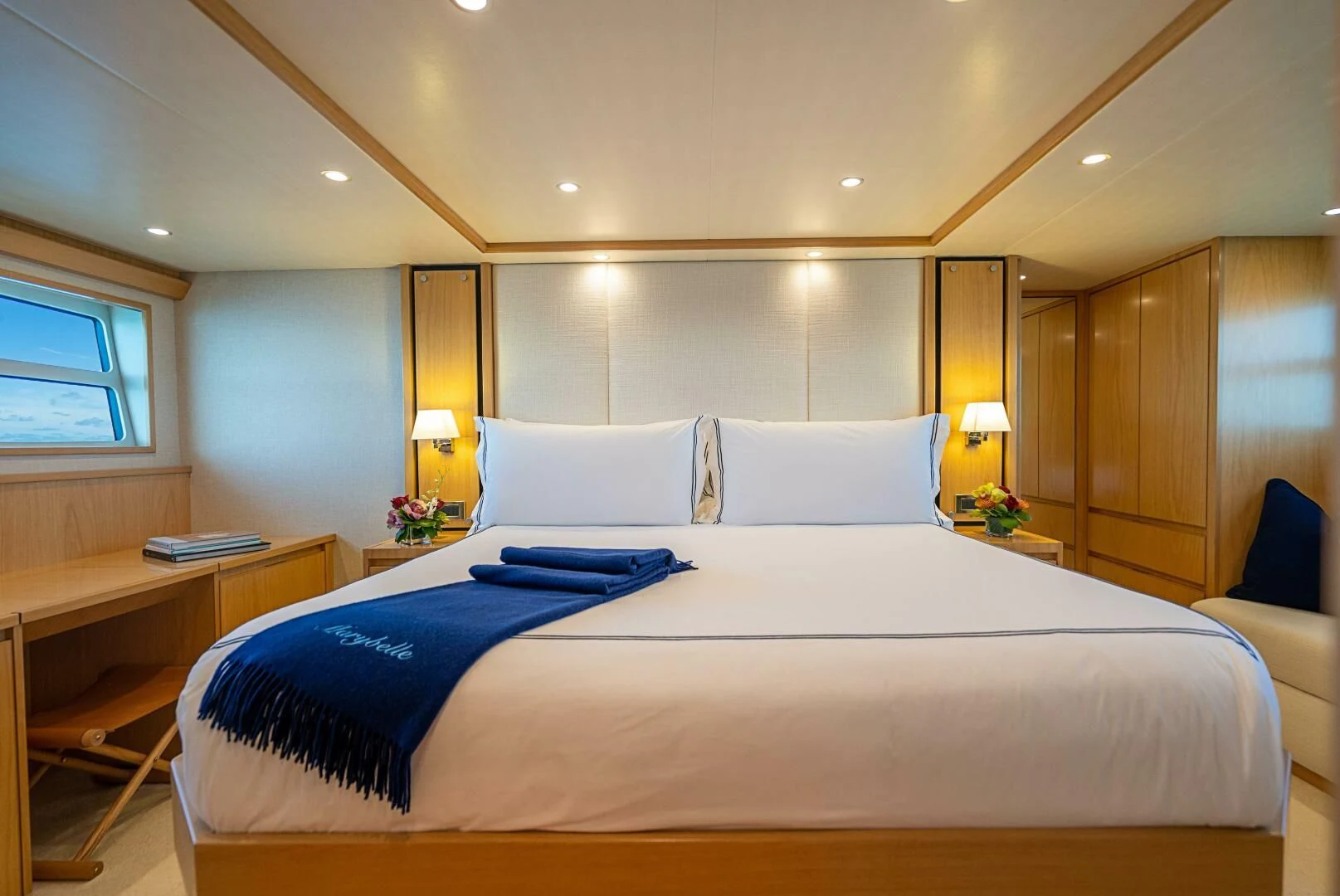 a large bedroom with a large bed aboard MARYBELLE Yacht for Sale