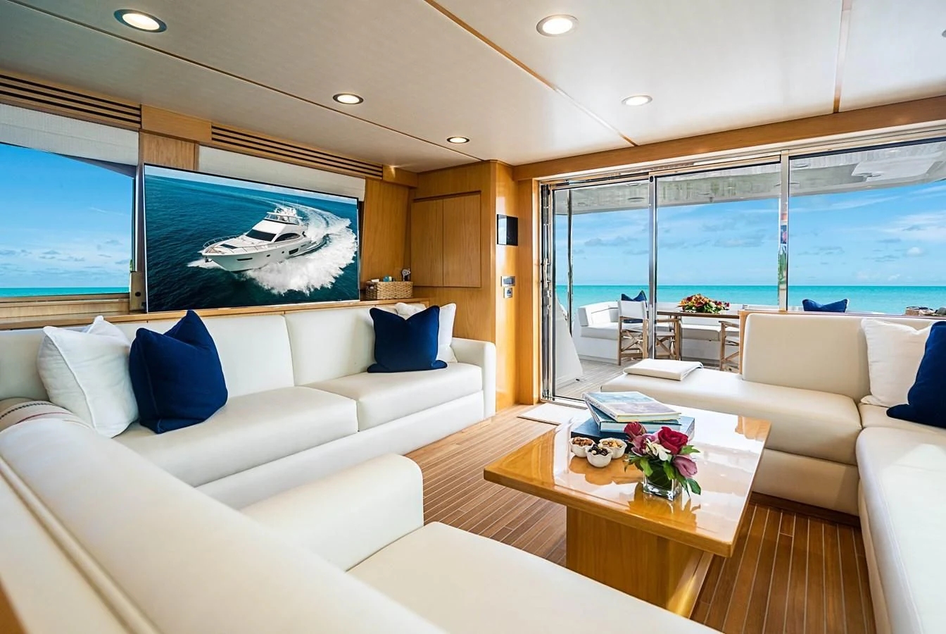 a living room with a large window aboard MARYBELLE Yacht for Sale