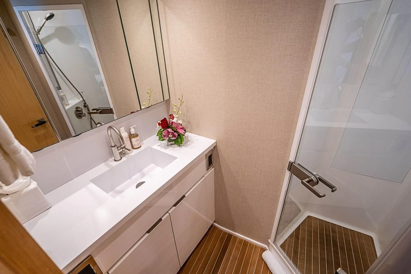 a bathroom with a sink and a mirror aboard MARYBELLE Yacht for Sale