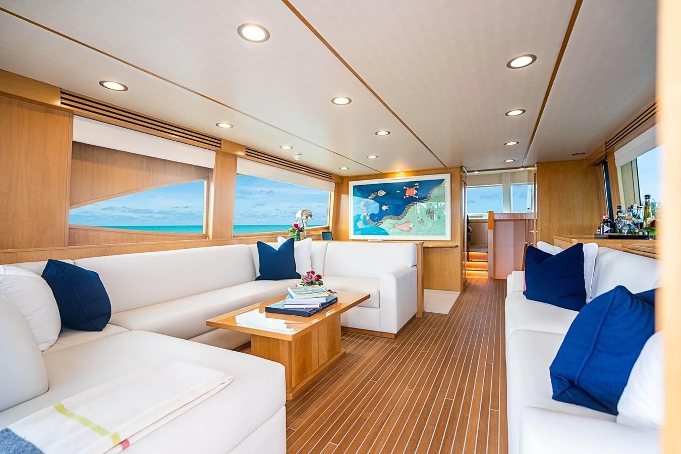a room with a bed and a table aboard MARYBELLE Yacht for Sale