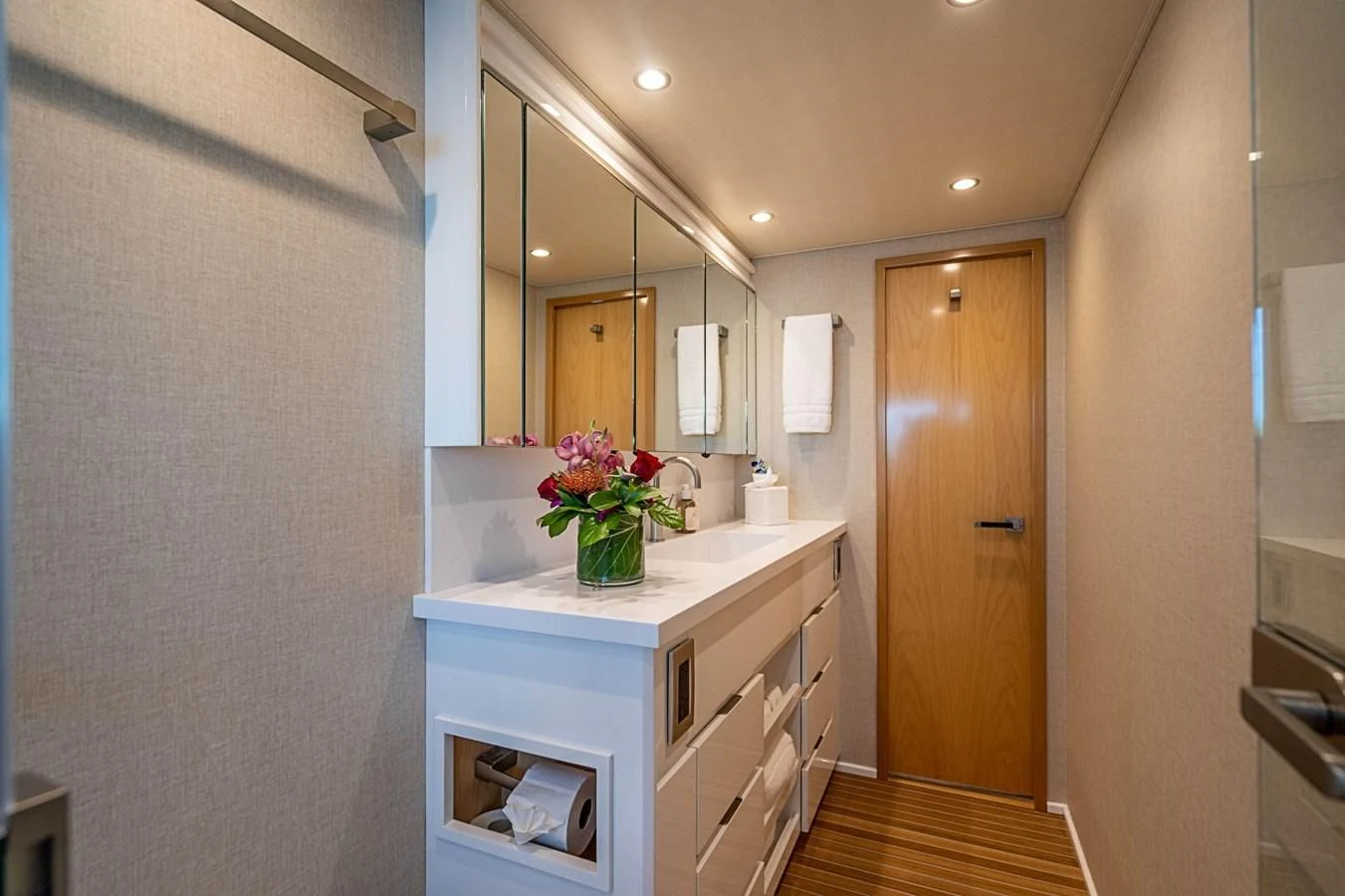 a bathroom with a sink and mirror aboard MARYBELLE Yacht for Sale