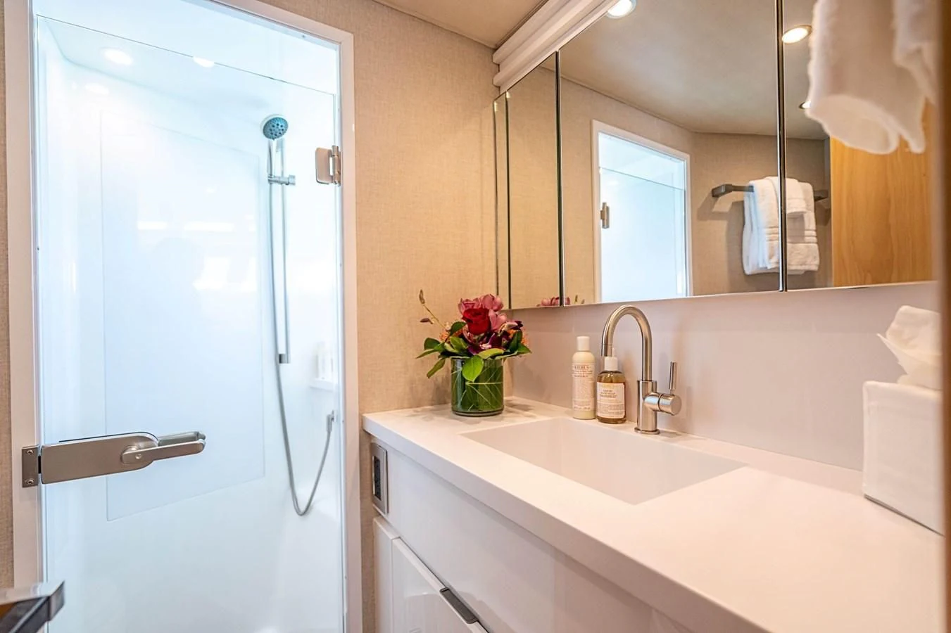 a bathroom with a sink and a mirror aboard MARYBELLE Yacht for Sale