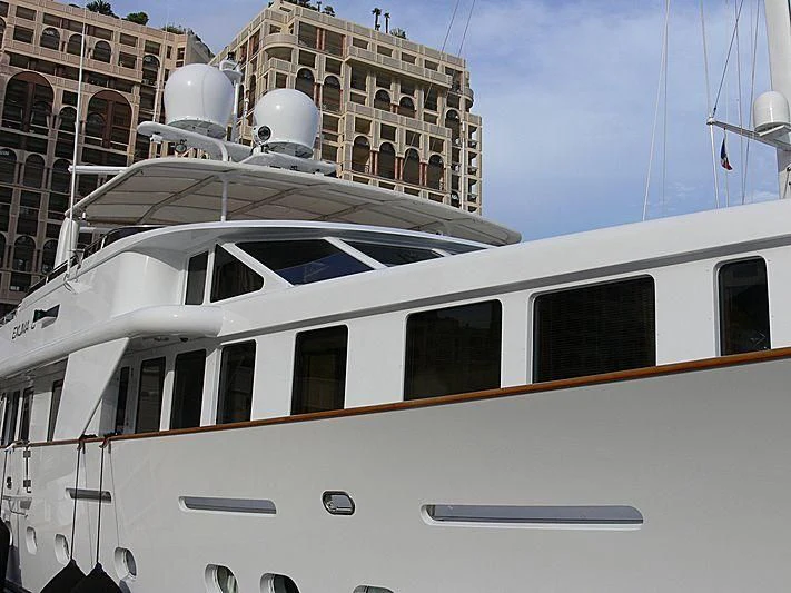 a white boat in a harbor aboard CRISS C Yacht for Sale