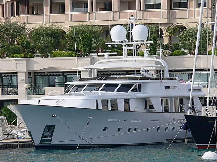 a white boat in a harbor aboard CRISS C Yacht for Sale
