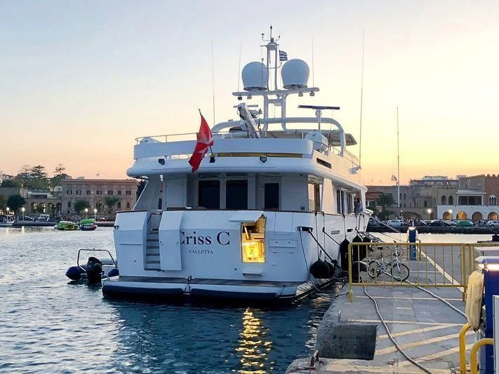a boat docked at a dock aboard CRISS C Yacht for Sale