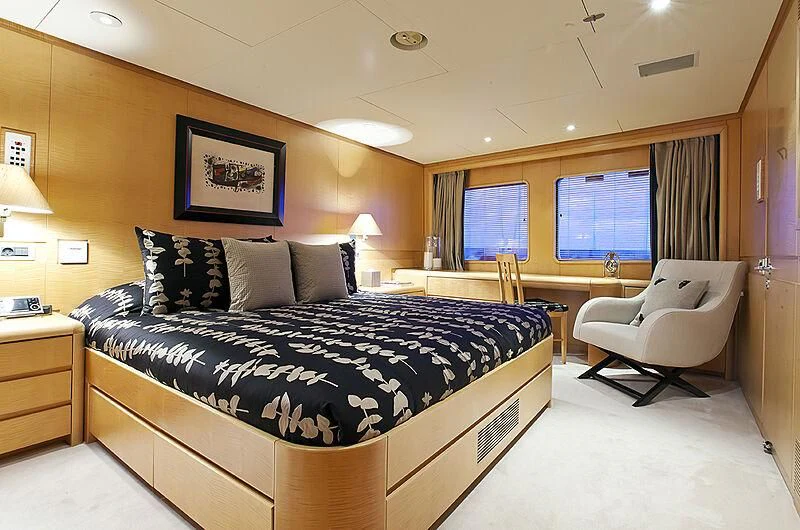 a large bedroom with a large bed aboard CRISS C Yacht for Sale