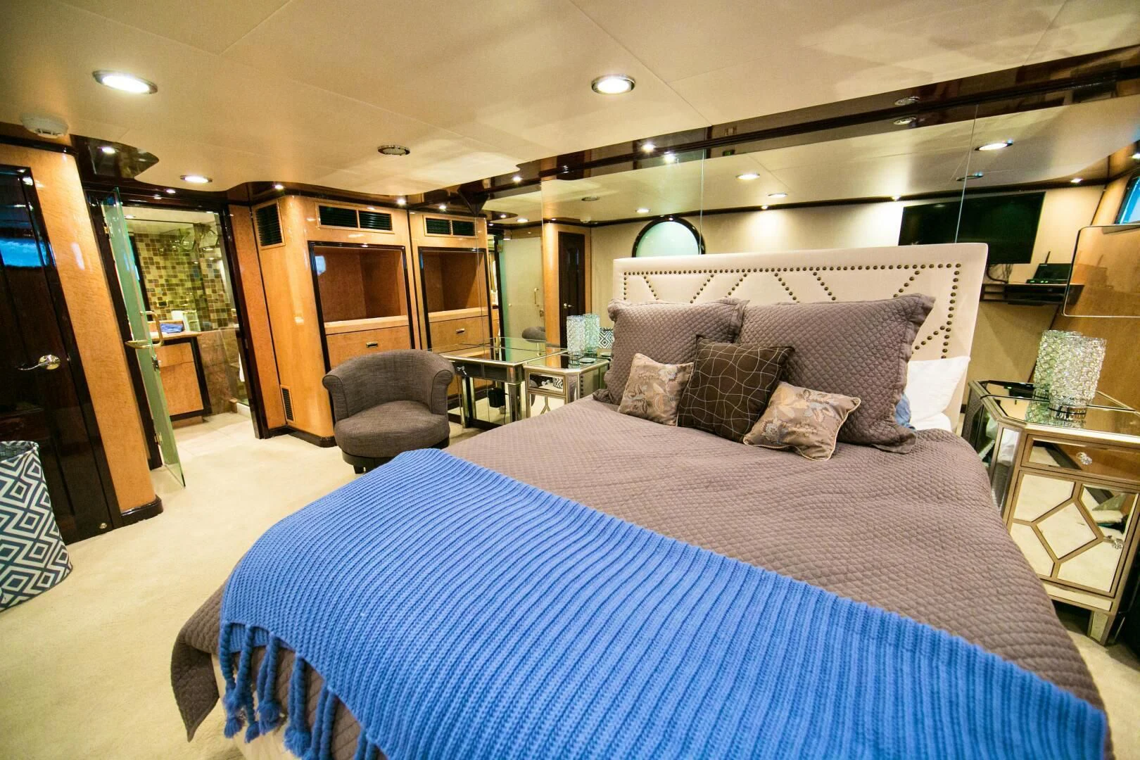a bed in a room aboard AURORA Yacht for Charter