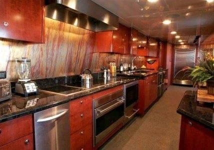 a kitchen with a large island aboard AURORA Yacht for Charter