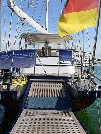 a boat with a sign on the front aboard BLACK MOLLY Yacht for Sale