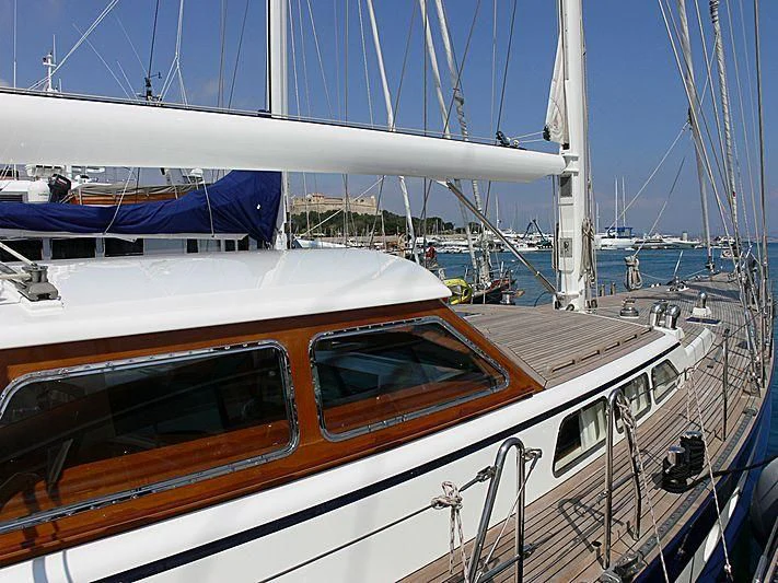 a boat is parked in a harbor aboard BLACK MOLLY Yacht for Sale