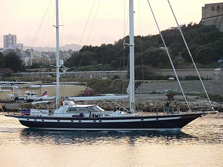 a boat in a harbor aboard BLACK MOLLY Yacht for Sale
