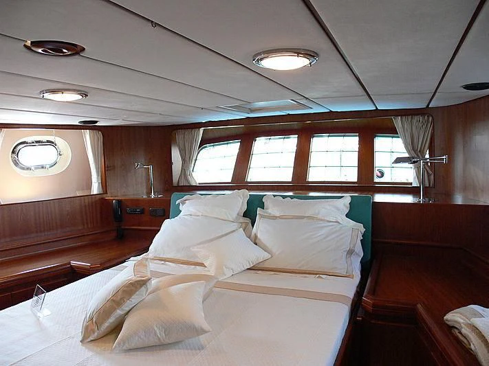 a room with two beds aboard BLACK MOLLY Yacht for Sale