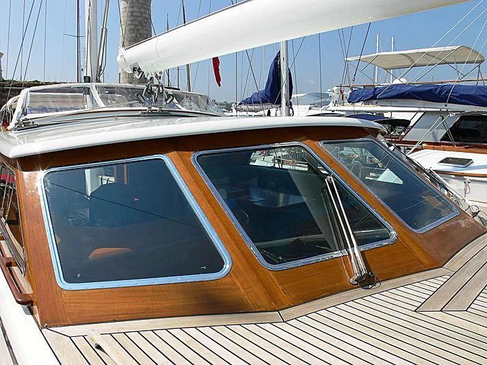a boat with a large window aboard BLACK MOLLY Yacht for Sale