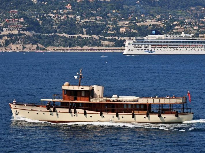 a boat on the water aboard OVER THE RAINBOW OF LONDON Yacht for Charter