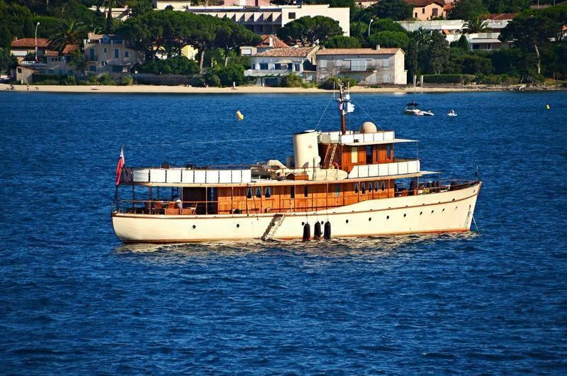 a boat on the water aboard OVER THE RAINBOW OF LONDON Yacht for Charter