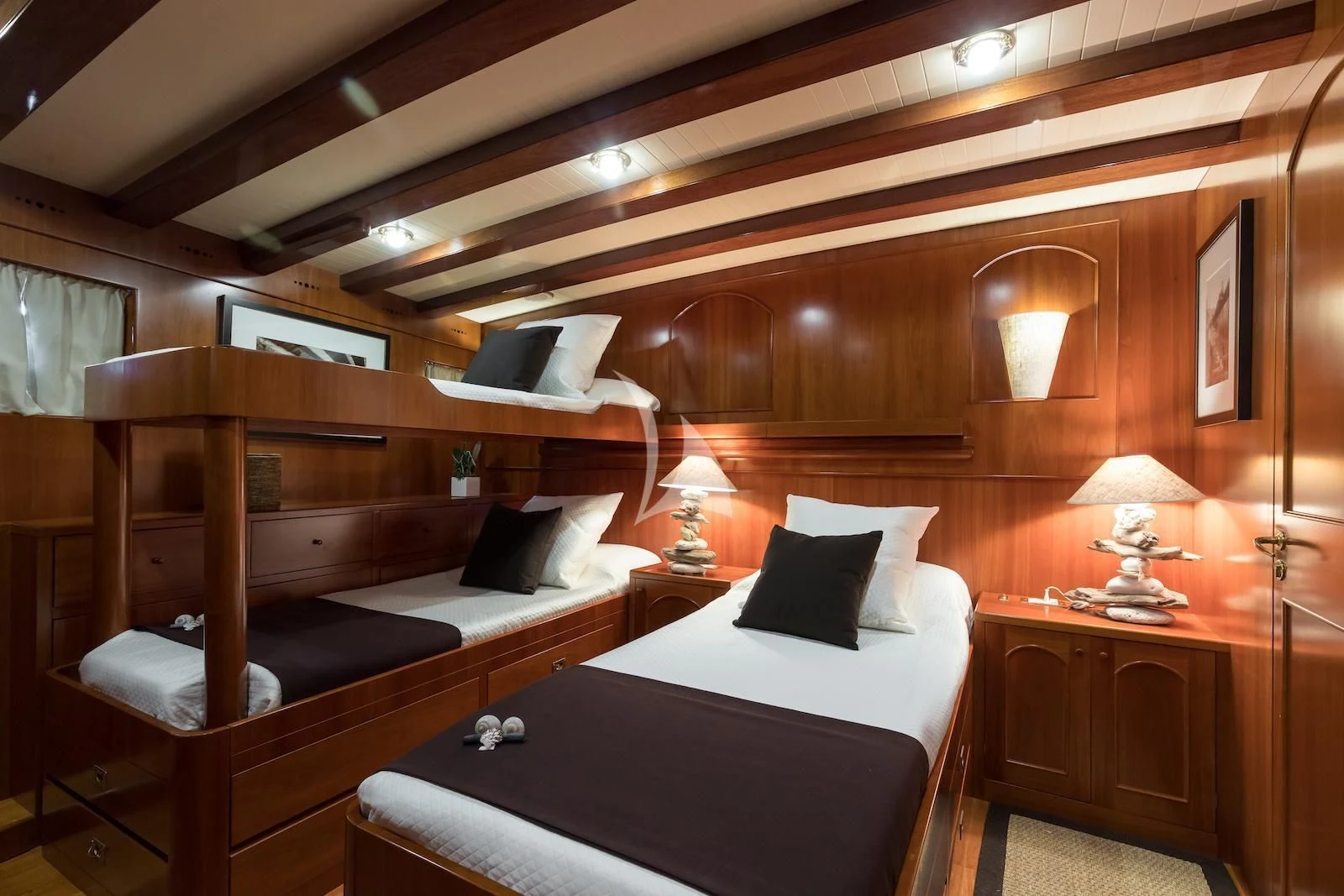 a room with two beds aboard OVER THE RAINBOW OF LONDON Yacht for Charter