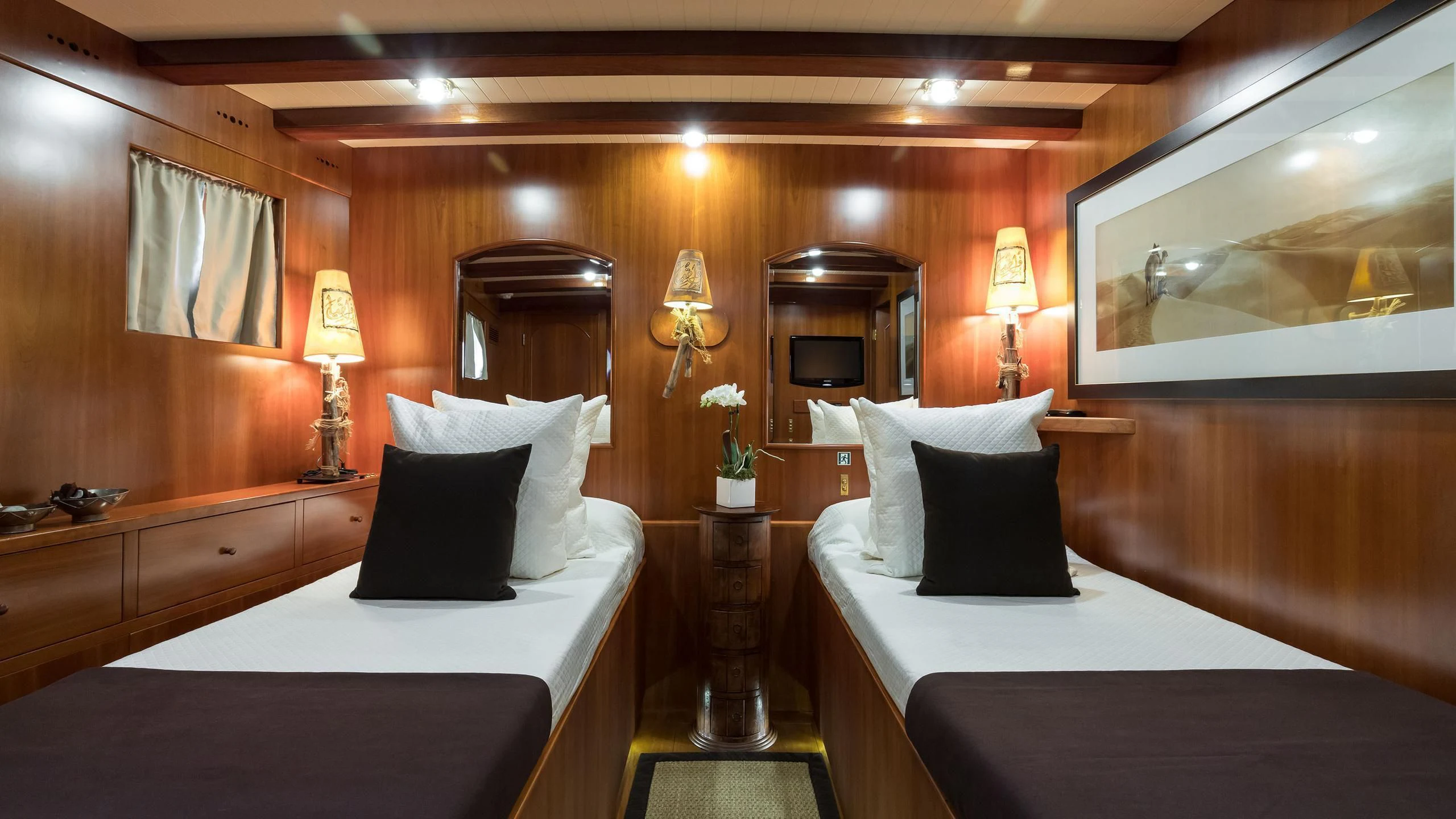 a room with two beds aboard OVER THE RAINBOW OF LONDON Yacht for Charter