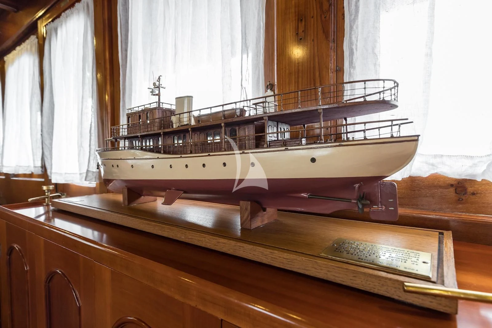 a large wooden boat aboard OVER THE RAINBOW OF LONDON Yacht for Charter