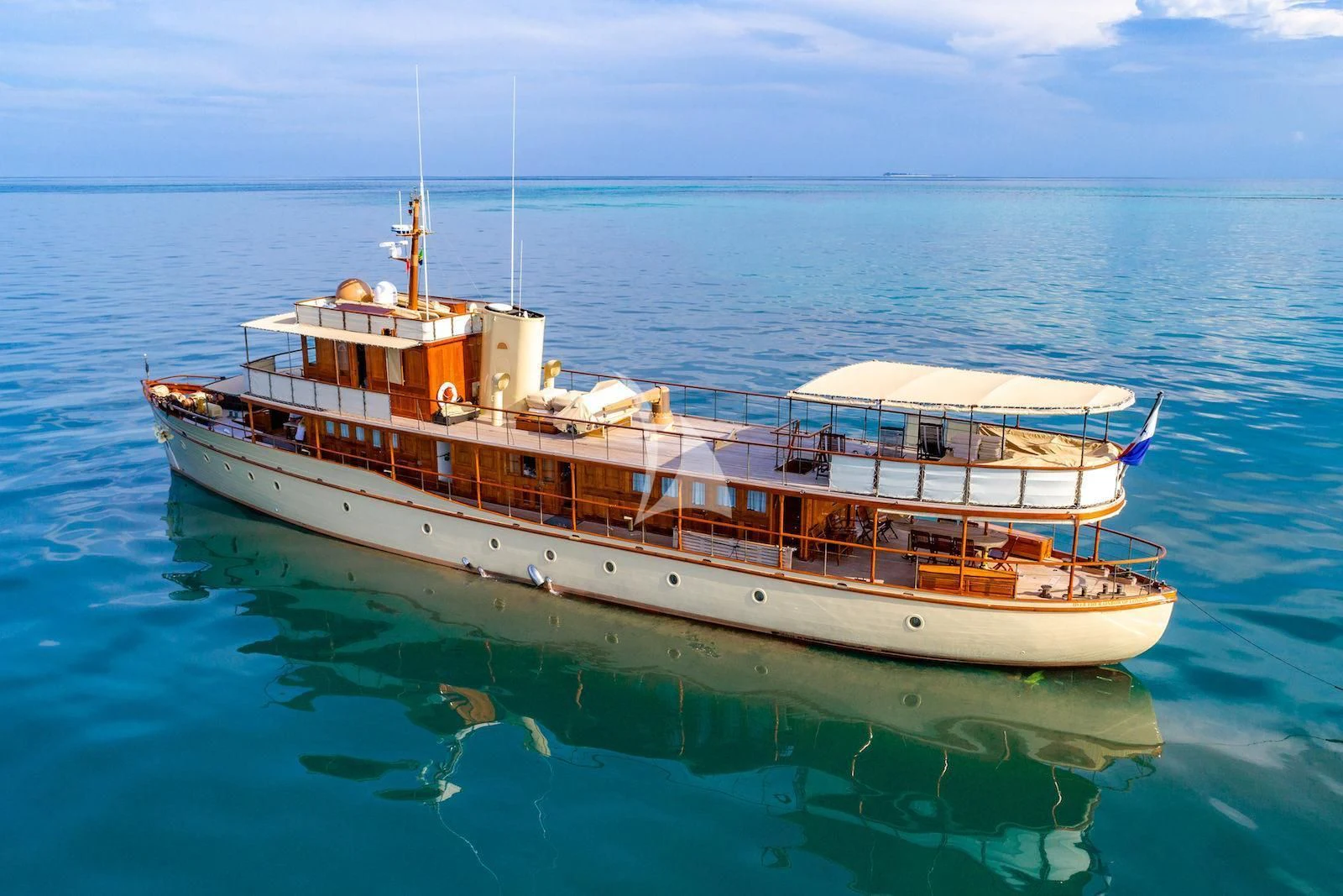 a boat on the water aboard OVER THE RAINBOW OF LONDON Yacht for Charter