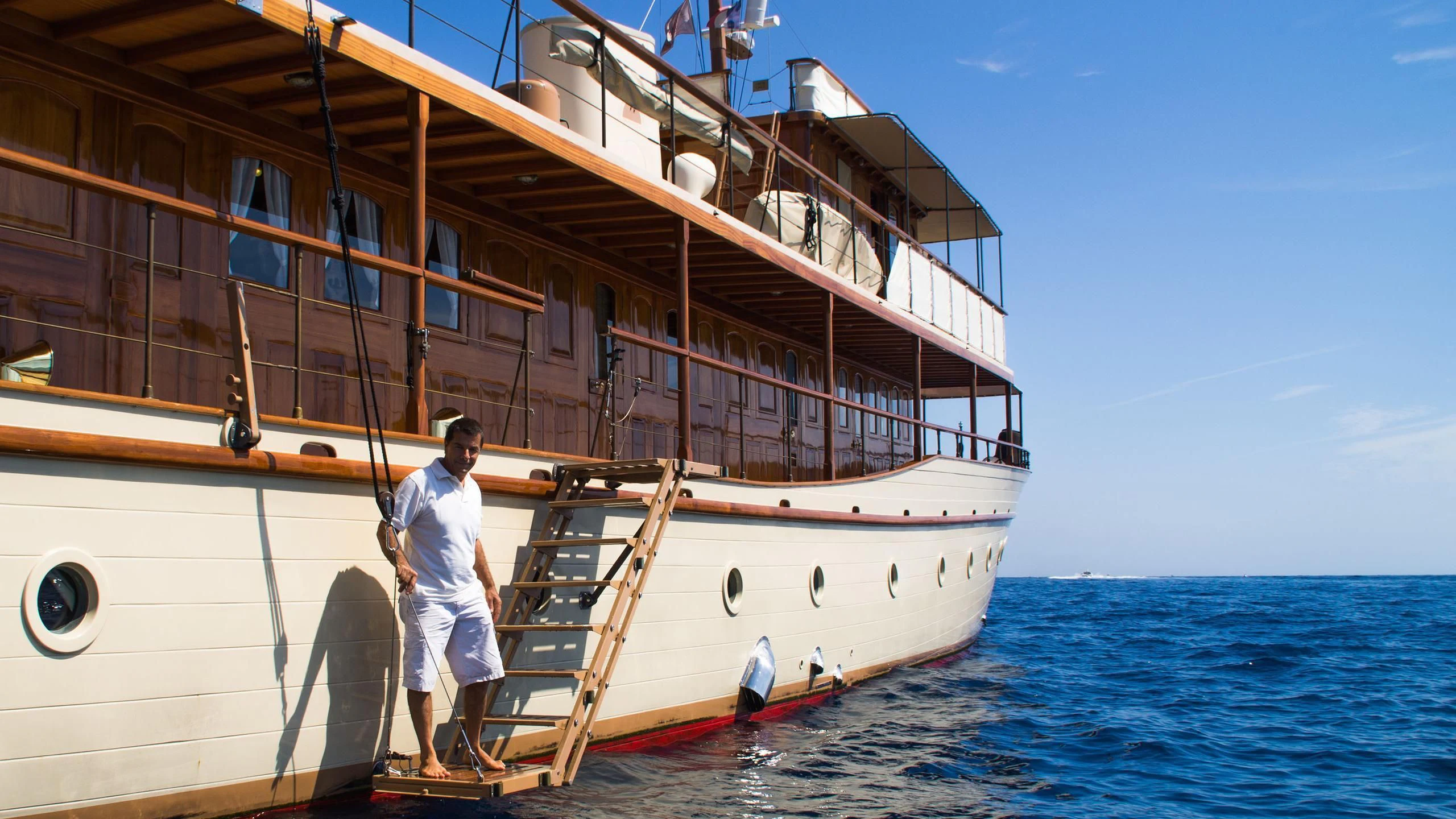 a person on a boat aboard OVER THE RAINBOW OF LONDON Yacht for Charter