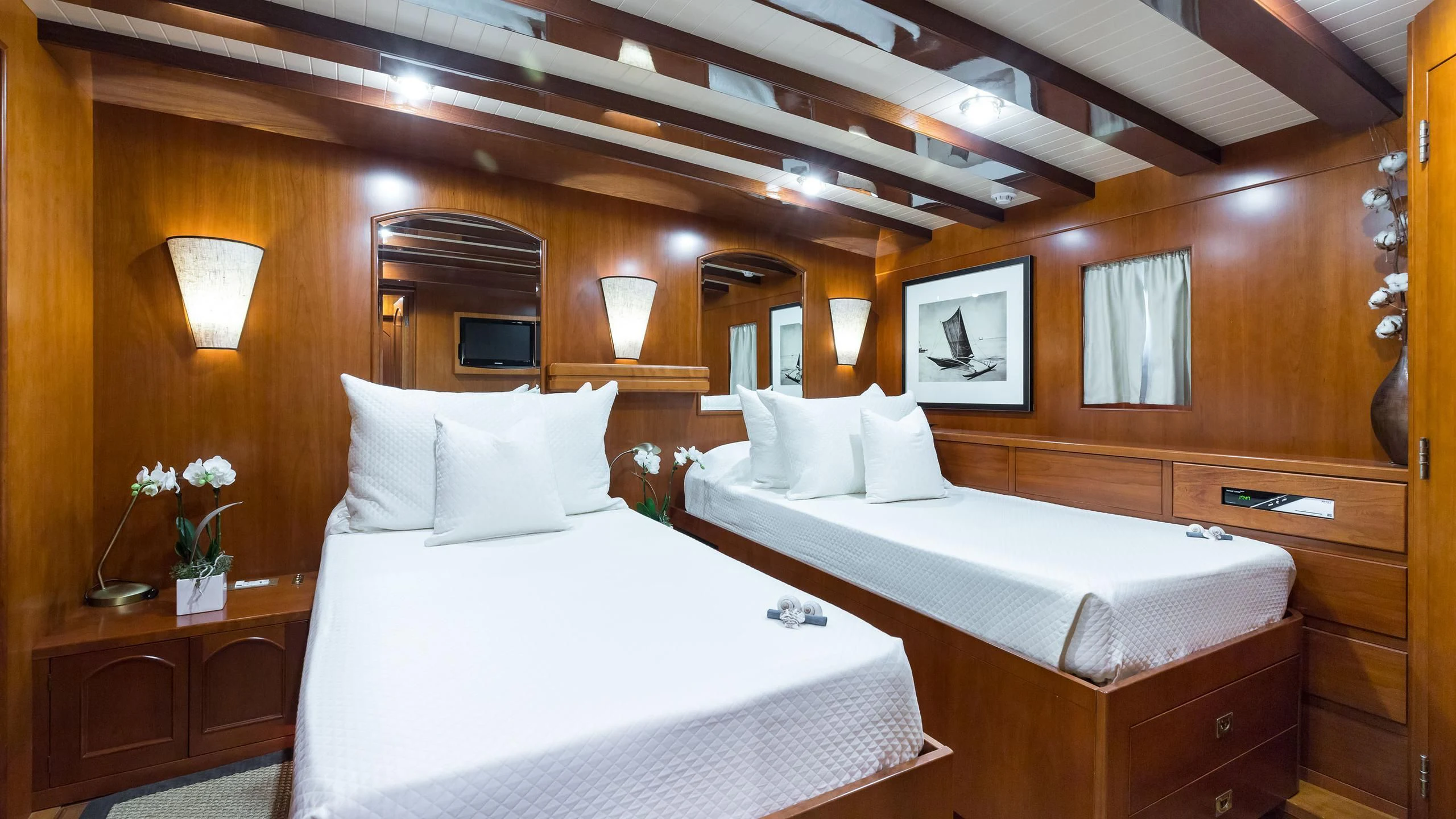 a room with two beds aboard OVER THE RAINBOW OF LONDON Yacht for Charter