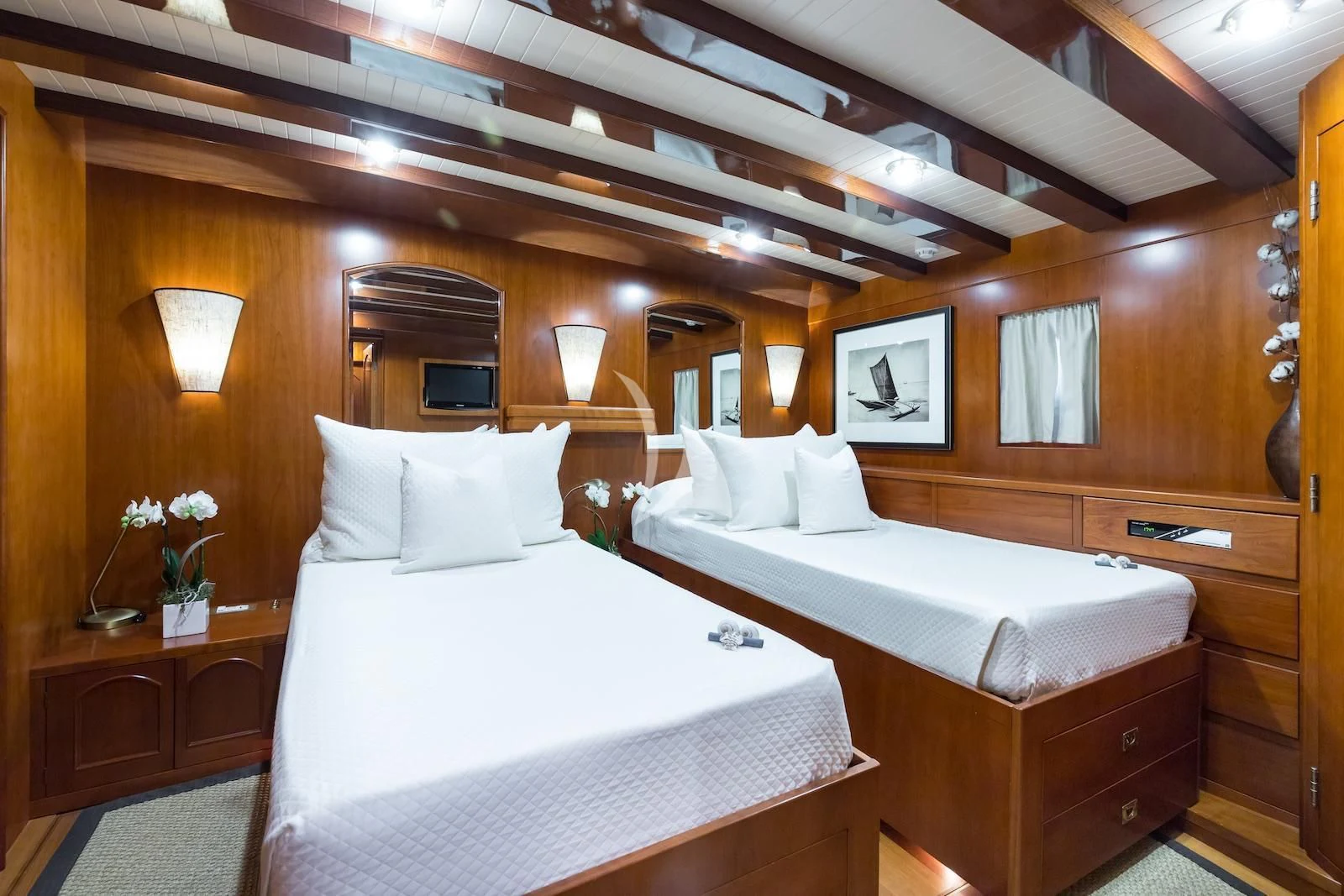 a room with two beds aboard OVER THE RAINBOW OF LONDON Yacht for Charter
