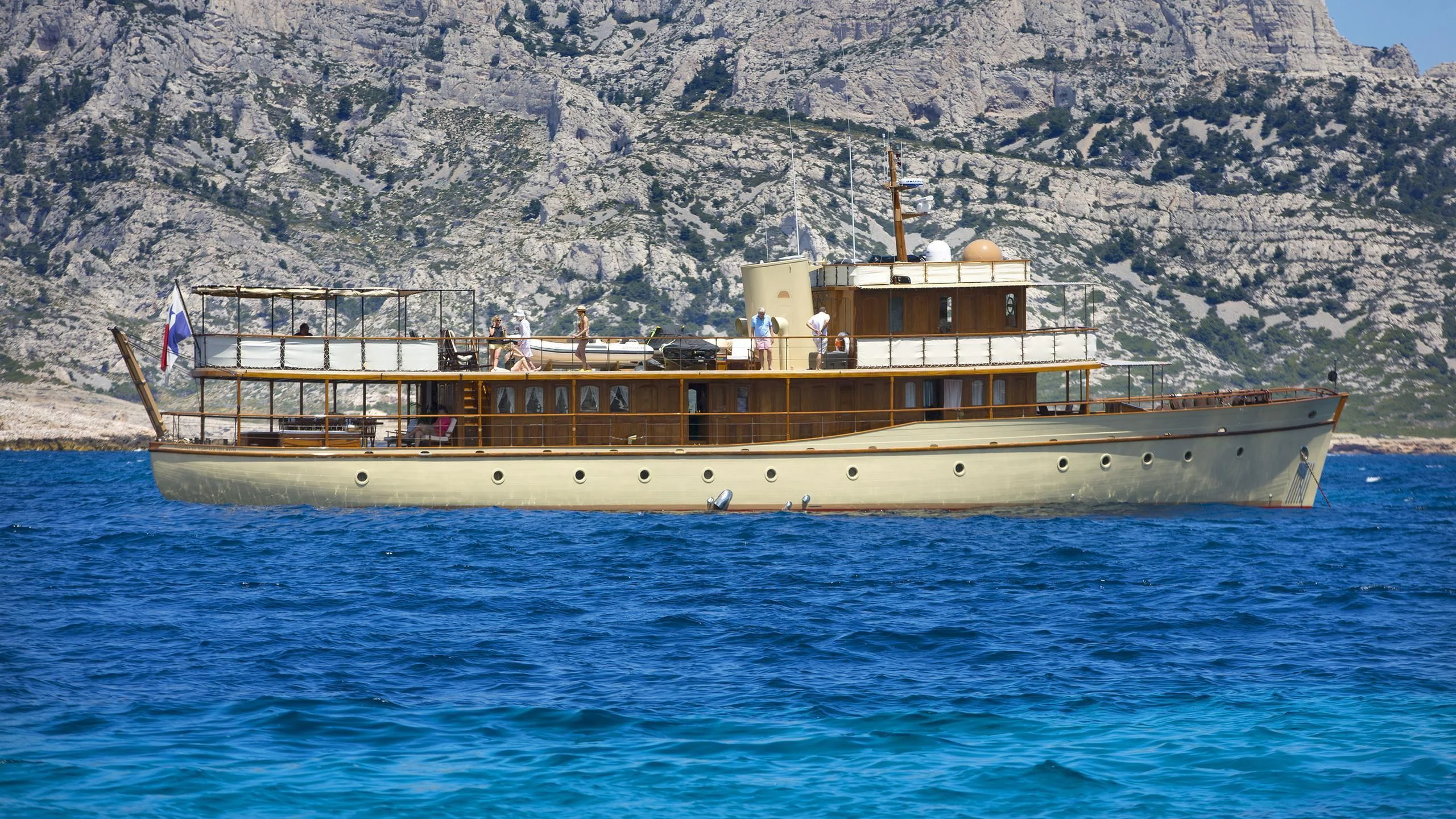 a boat on the water aboard OVER THE RAINBOW OF LONDON Yacht for Charter