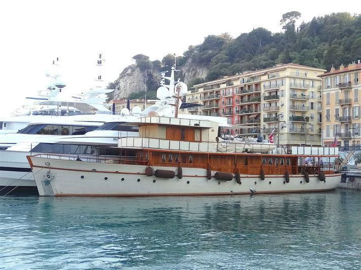 a large white boat in the water aboard OVER THE RAINBOW OF LONDON Yacht for Charter