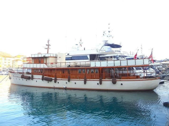 a large boat on the water aboard OVER THE RAINBOW OF LONDON Yacht for Charter