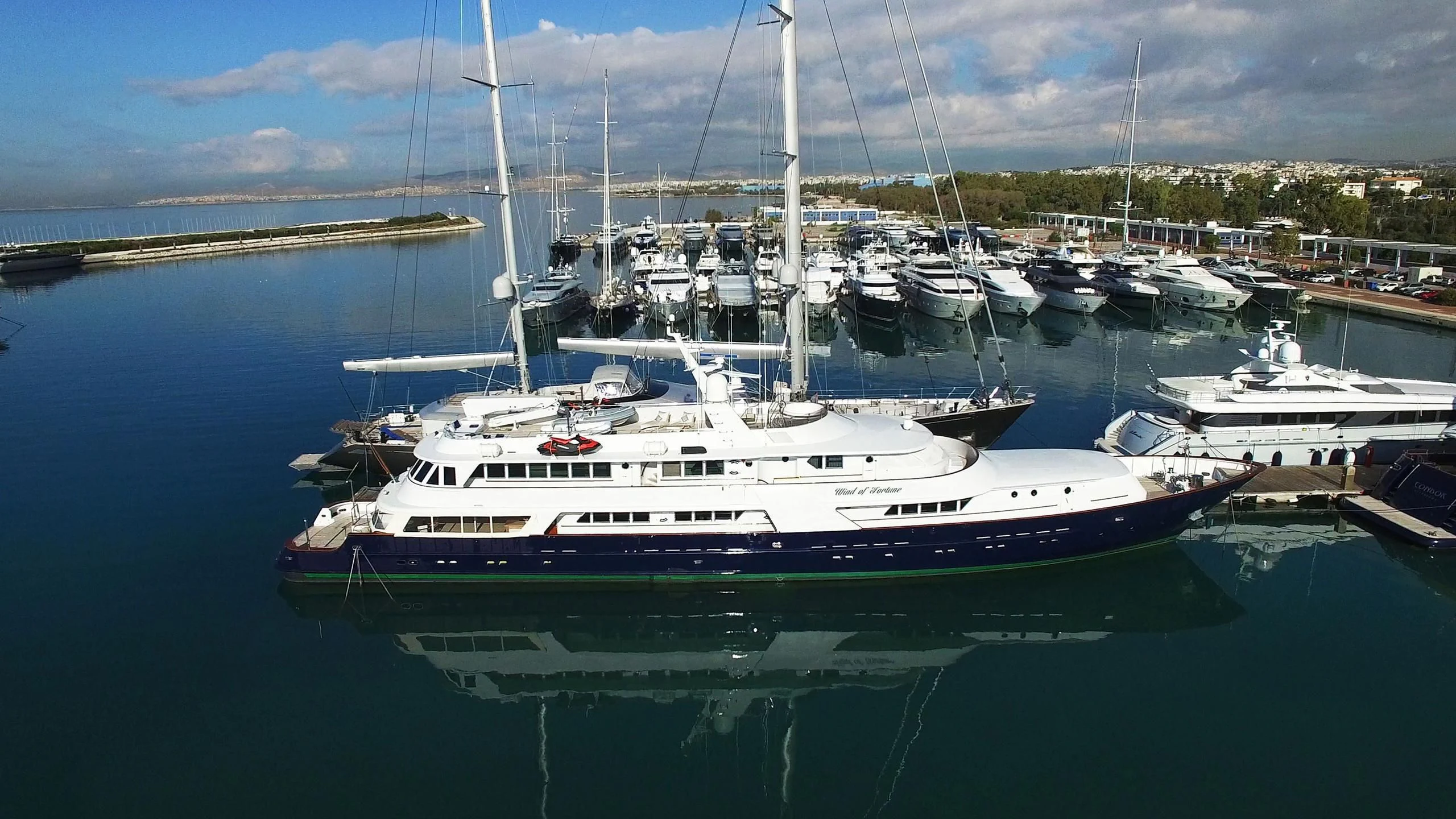 a group of boats in a harbor aboard WIND OF FORTUNE Yacht for Charter
