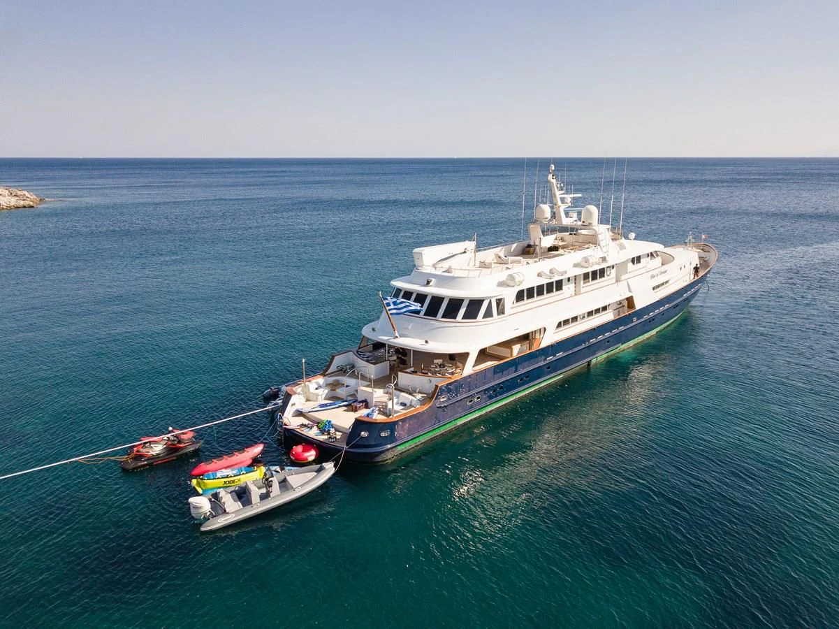 a large ship in the water aboard WIND OF FORTUNE Yacht for Charter