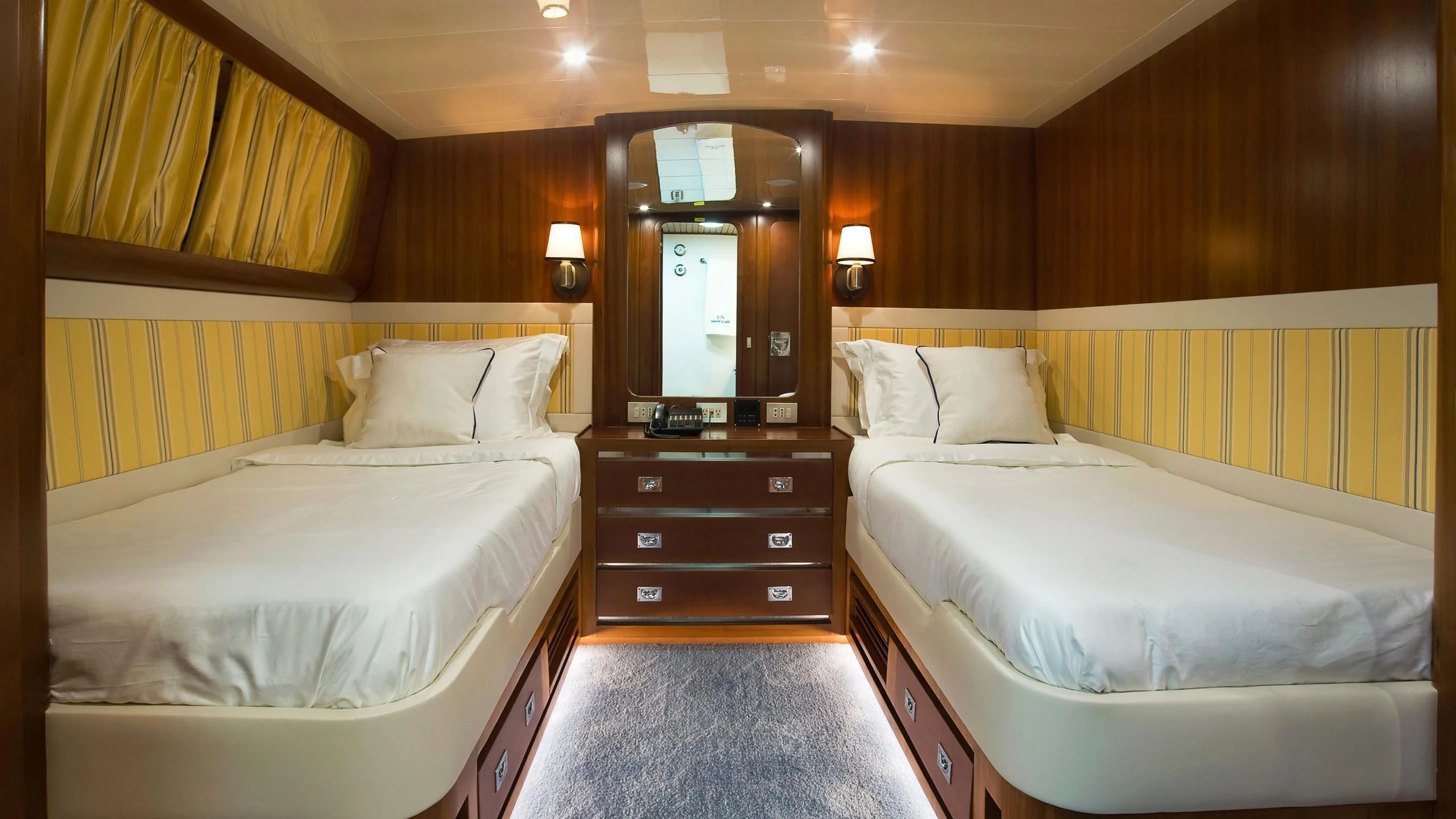 a room with two beds aboard WIND OF FORTUNE Yacht for Charter
