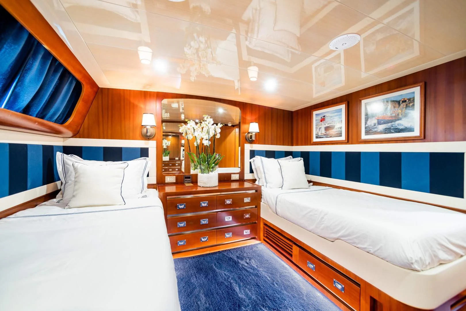a room with two beds aboard WIND OF FORTUNE Yacht for Charter