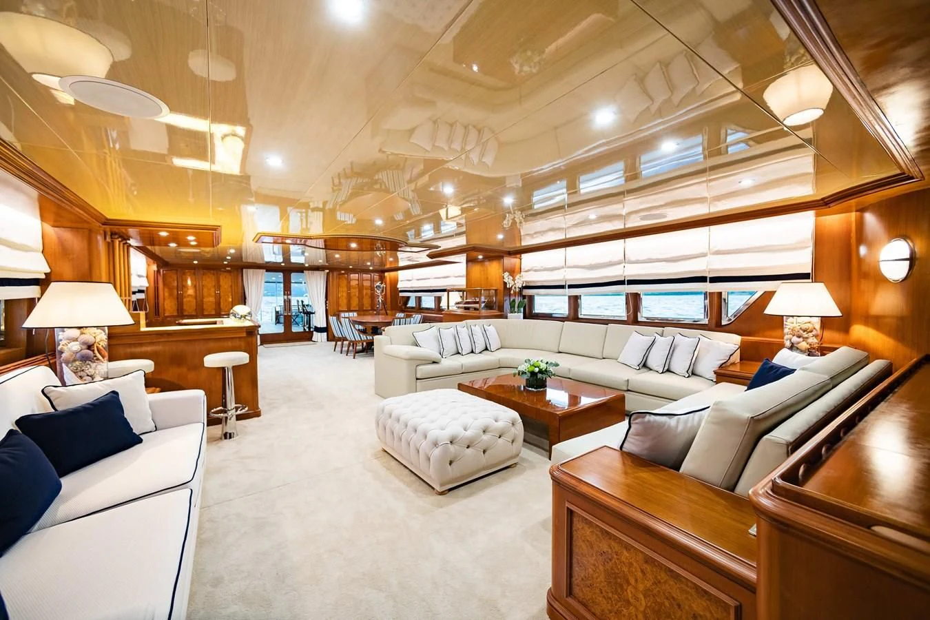 a living room with a large open window aboard WIND OF FORTUNE Yacht for Charter