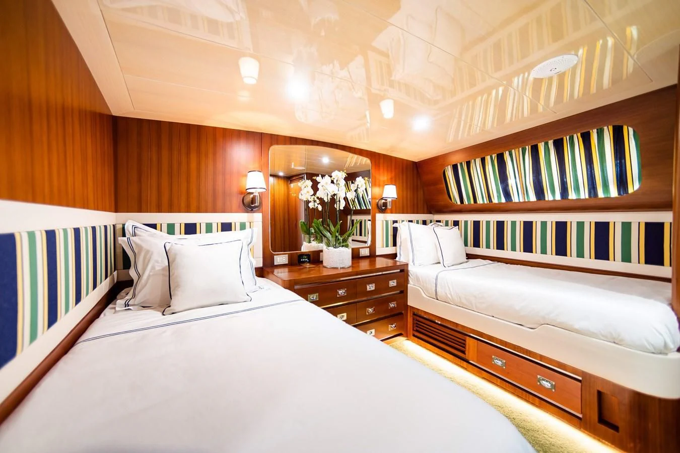 a room with two beds aboard WIND OF FORTUNE Yacht for Charter