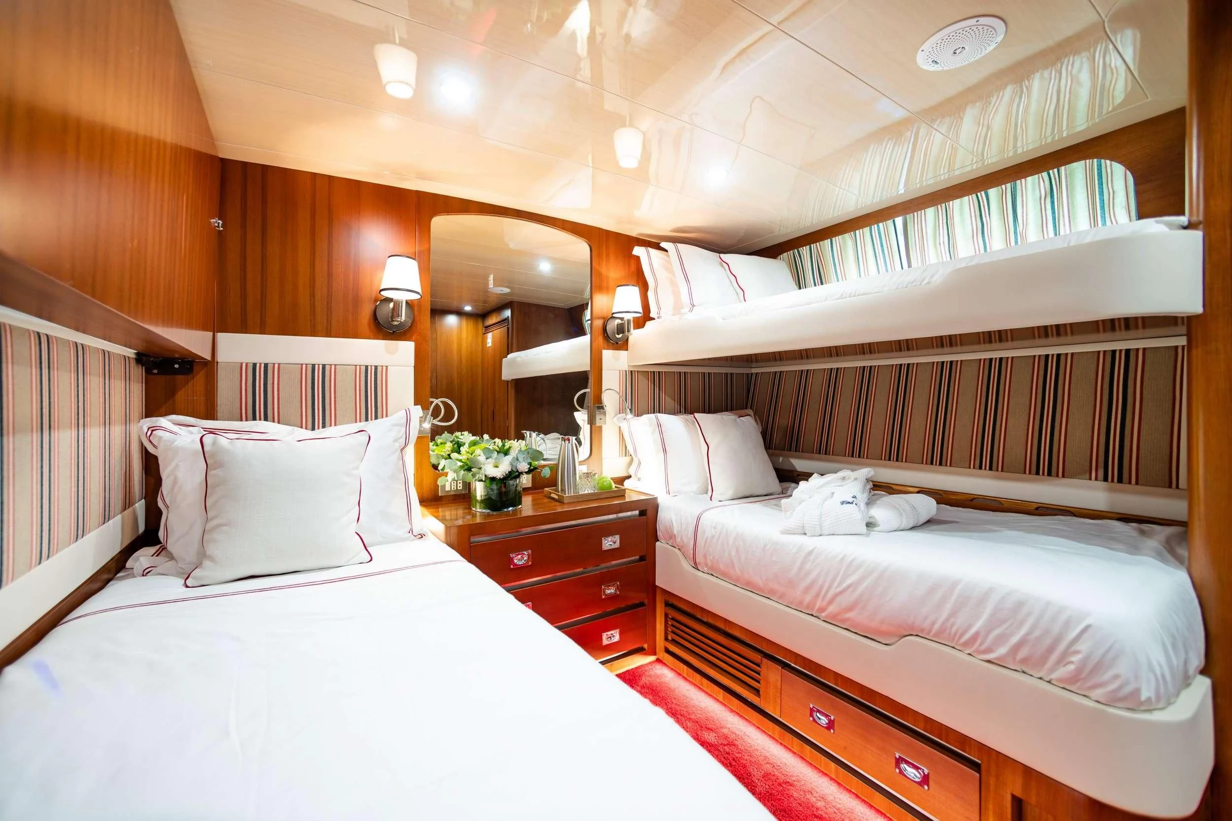 a room with two beds aboard WIND OF FORTUNE Yacht for Charter