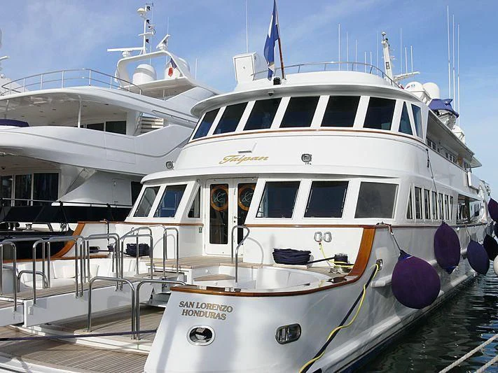 a white yacht docked aboard WIND OF FORTUNE Yacht for Charter