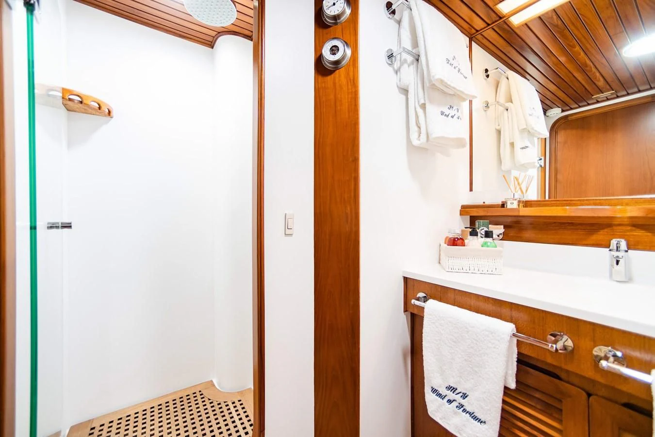 a bathroom with a sink and cabinets aboard WIND OF FORTUNE Yacht for Charter