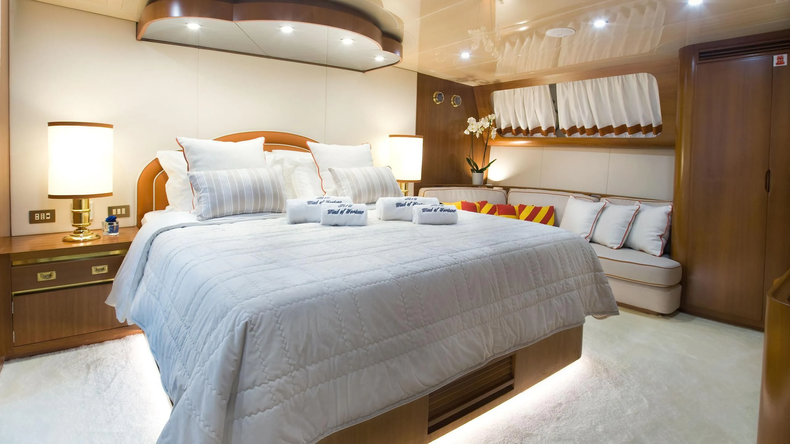 a hotel room with two beds aboard WIND OF FORTUNE Yacht for Charter