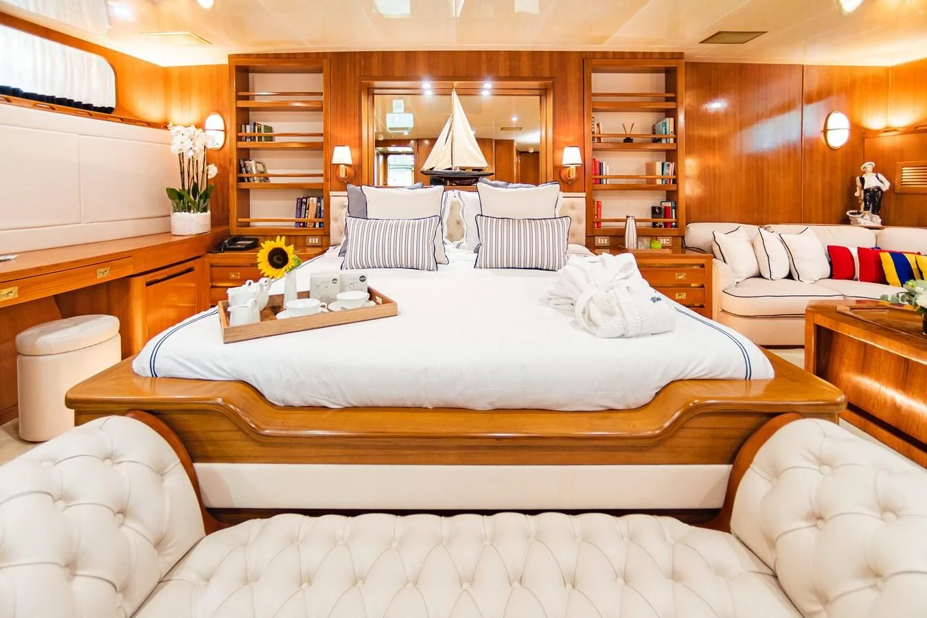 a large bed in a room aboard WIND OF FORTUNE Yacht for Charter