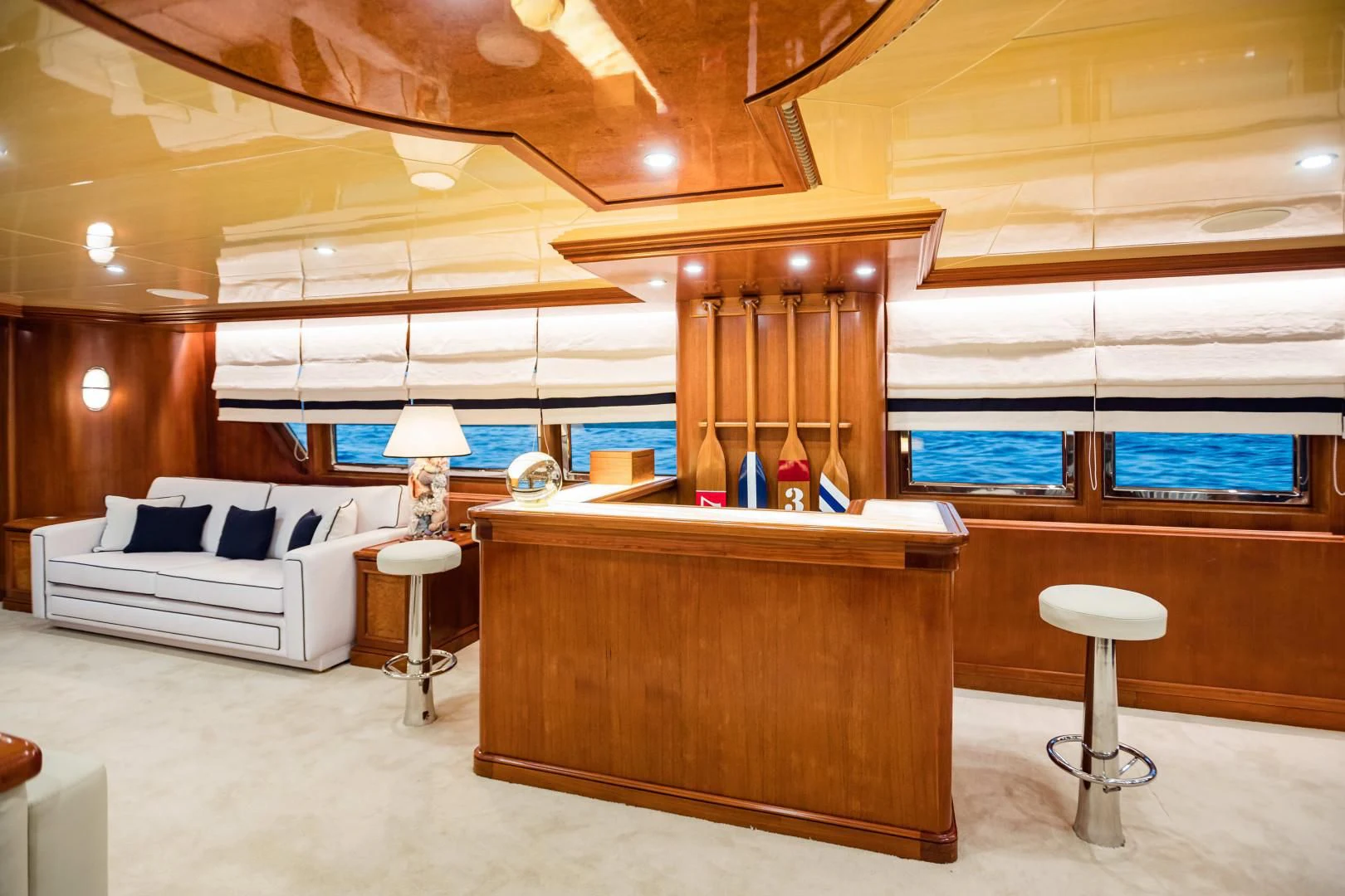 a room with a bed and a couch aboard WIND OF FORTUNE Yacht for Charter