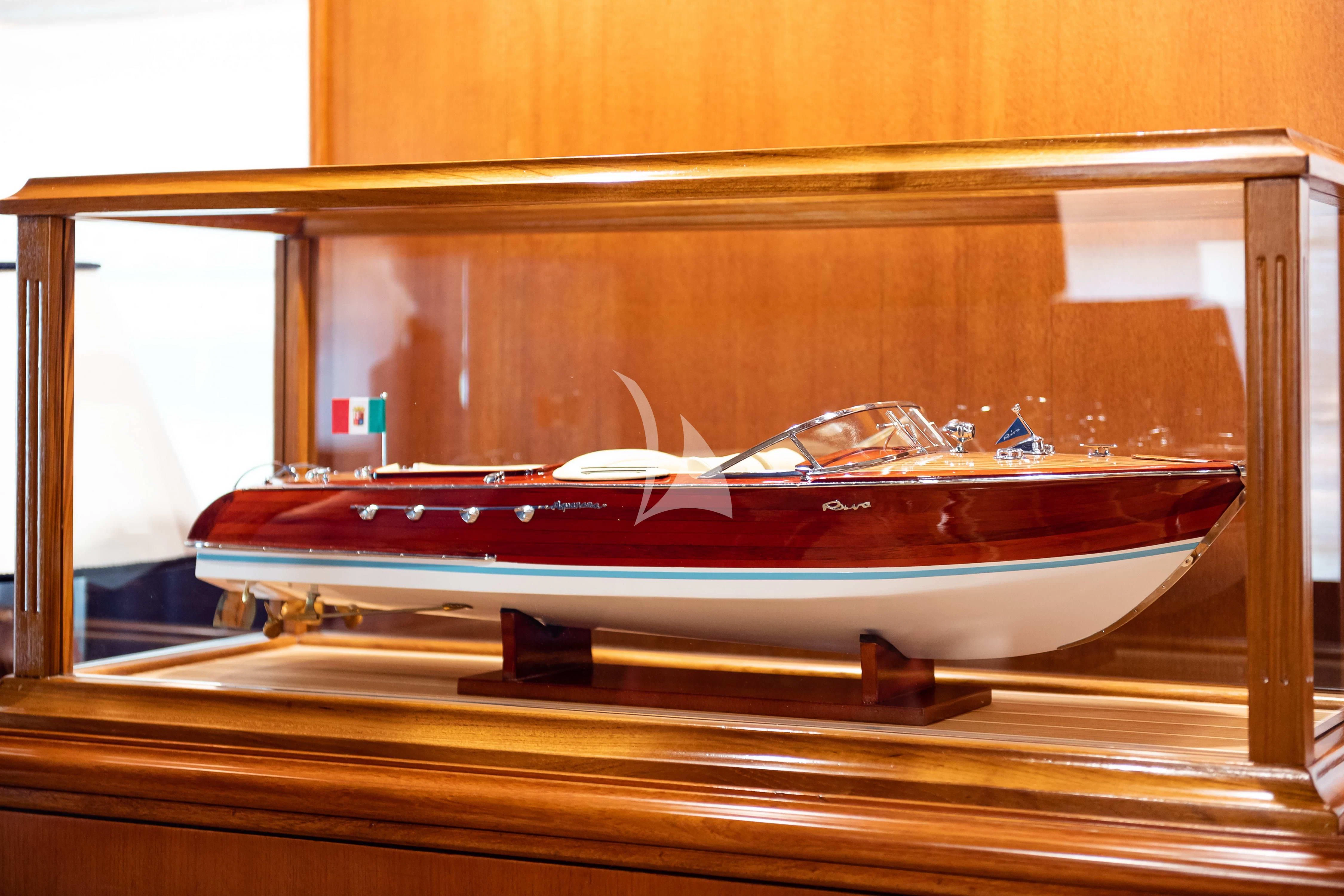 a boat in a wooden frame aboard WIND OF FORTUNE Yacht for Charter