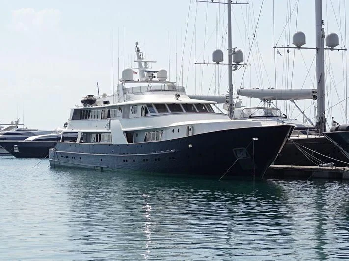 a large white boat in the water aboard WIND OF FORTUNE Yacht for Charter