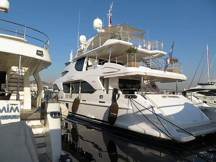 a boat docked at a pier aboard MY TWINZZ Yacht for Sale