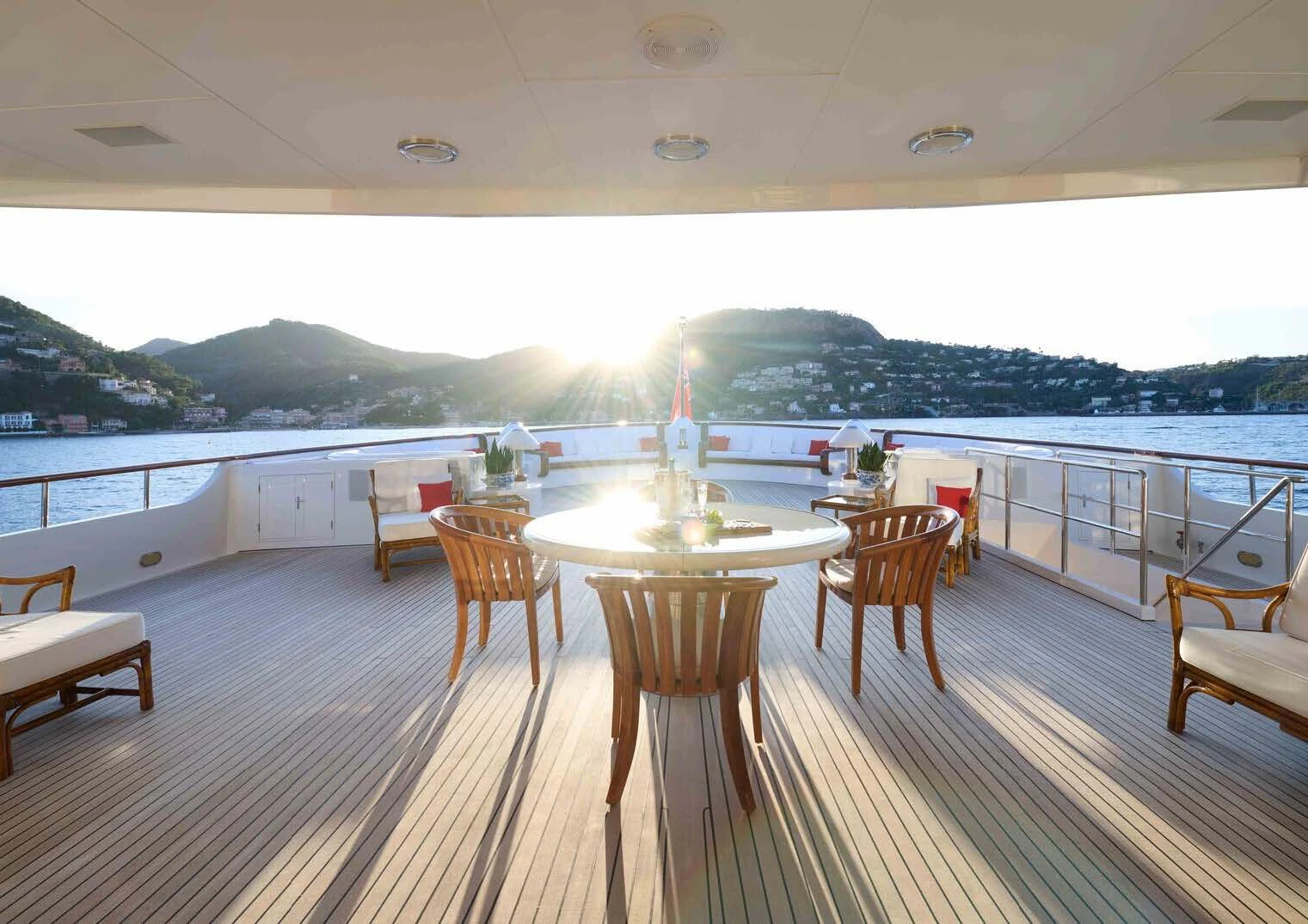 a table and chairs on a deck aboard LADY BEATRICE Yacht for Sale