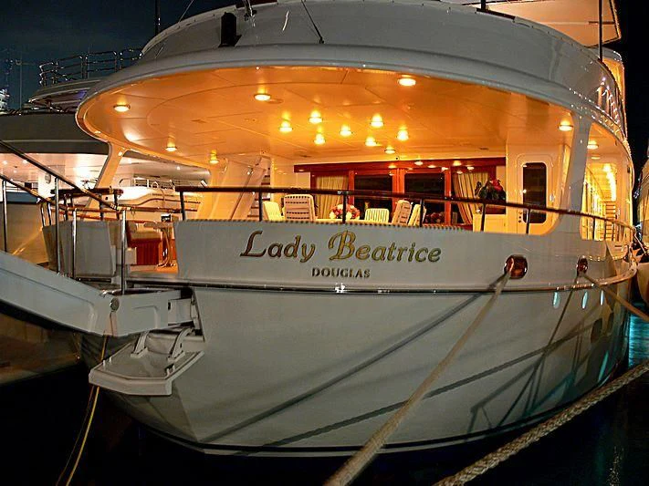 a large white yacht in a building aboard LADY BEATRICE Yacht for Sale