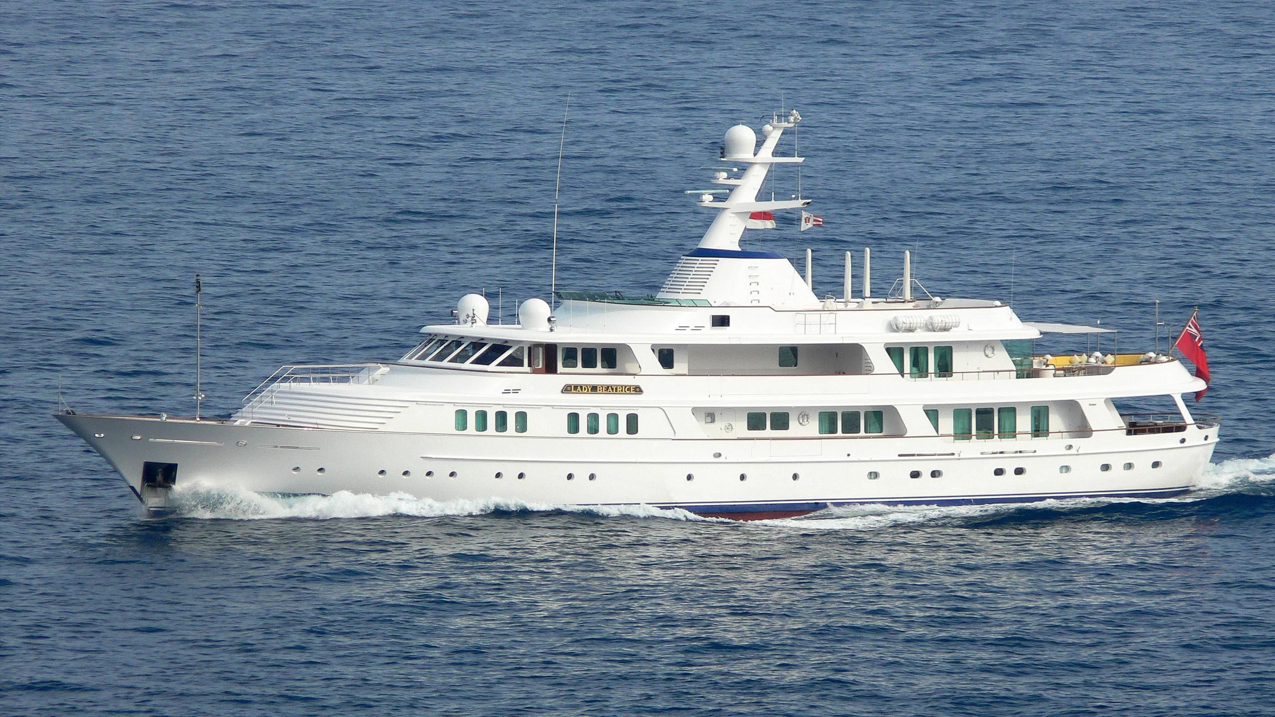 a large white boat in the water aboard LADY BEATRICE Yacht for Sale