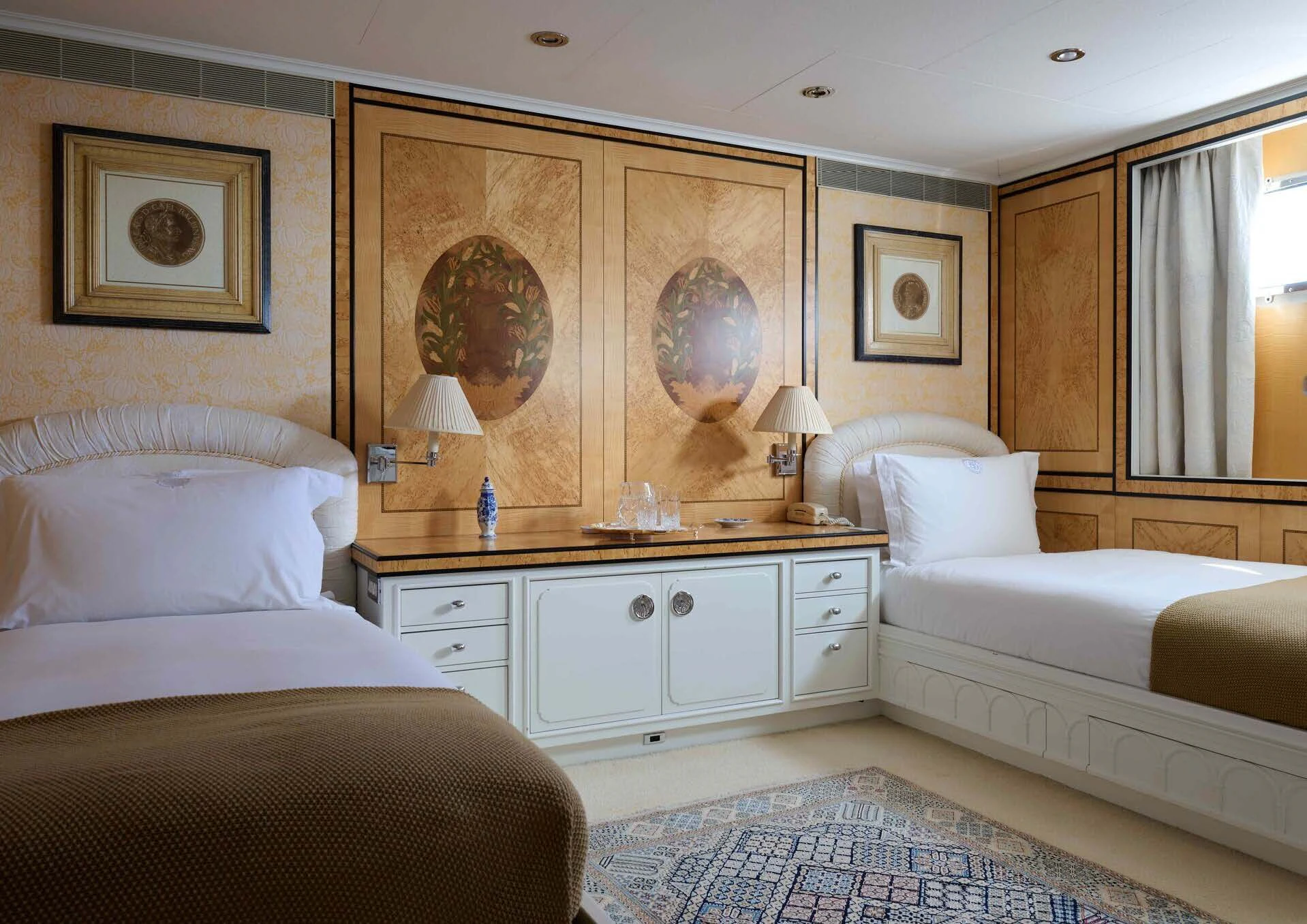 a room with a couple of beds aboard LADY BEATRICE Yacht for Sale