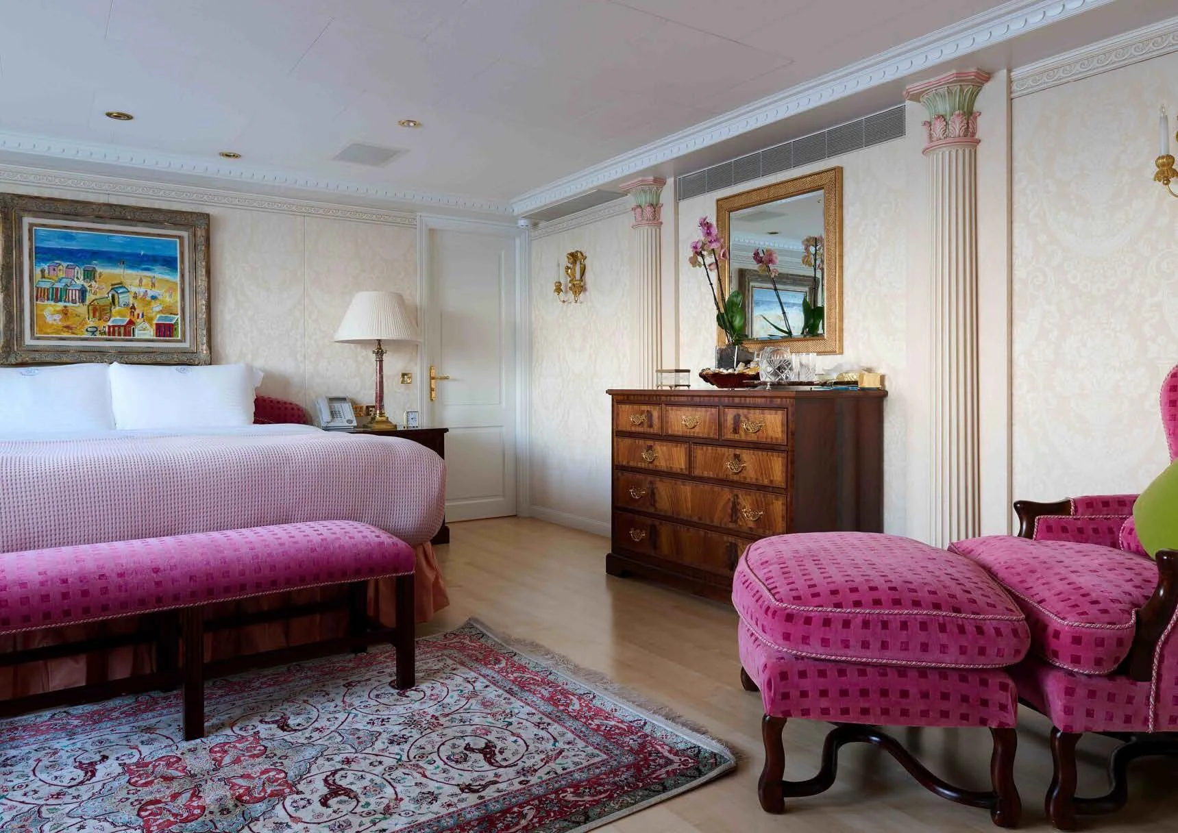 a bedroom with a bed and a dresser aboard LADY BEATRICE Yacht for Sale